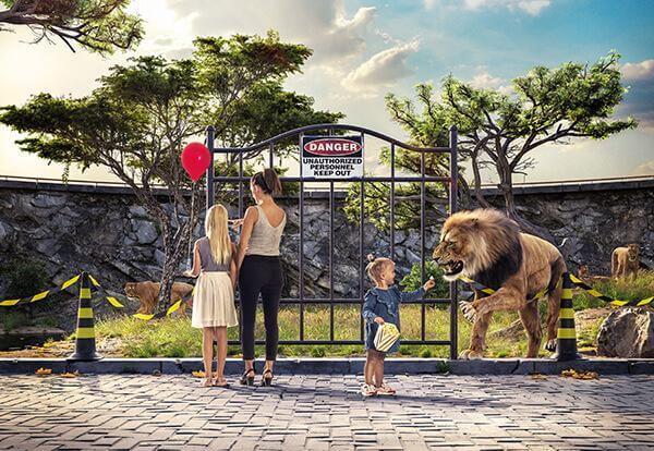 A family at a zoo. The safe guarding isn't safe and a lion escapes.