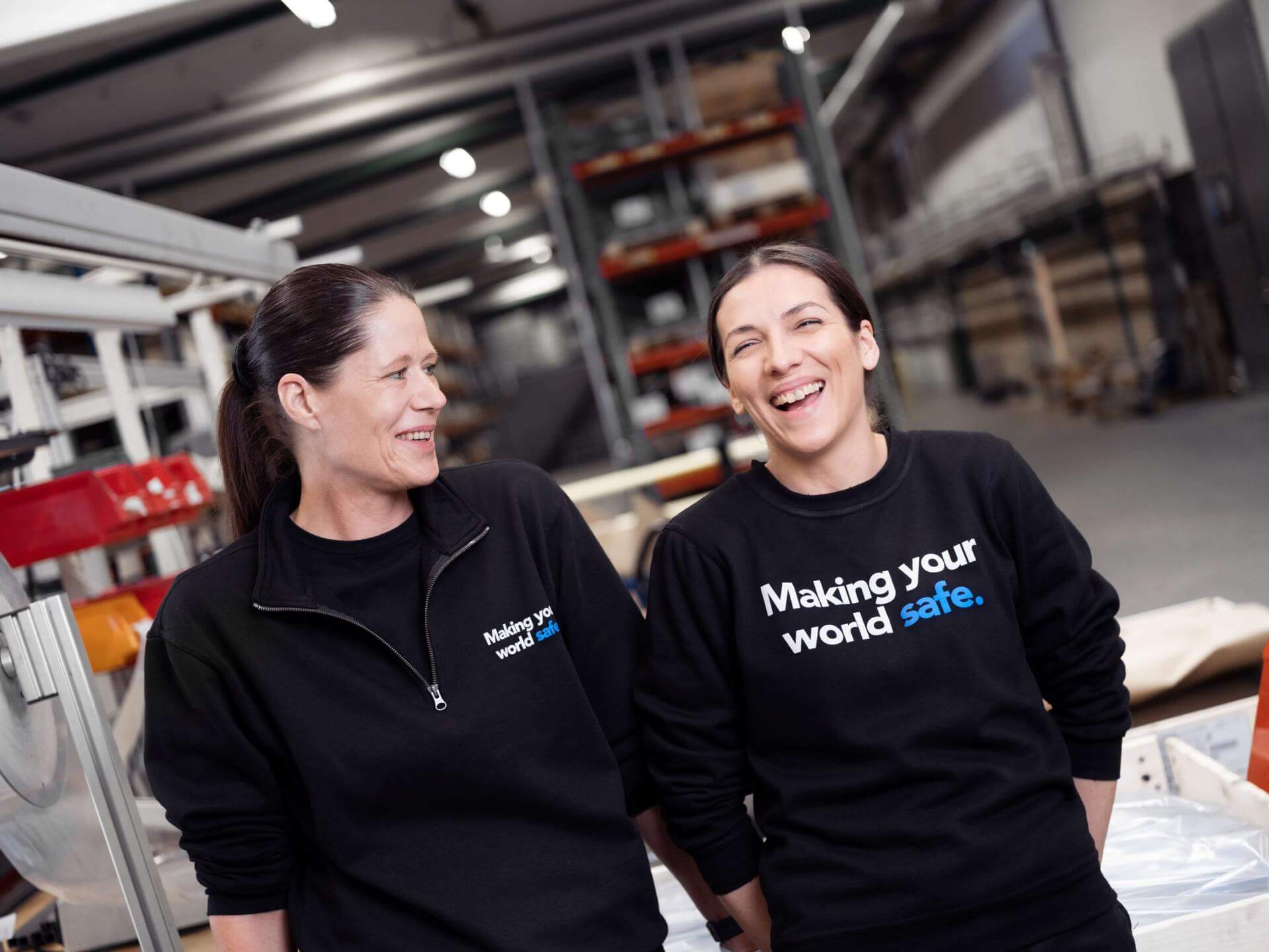 Two women at a production site.