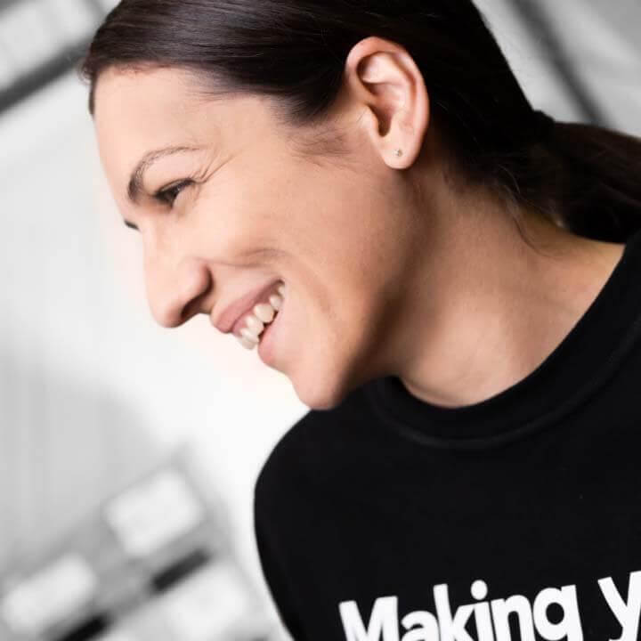A Troax employee smiling