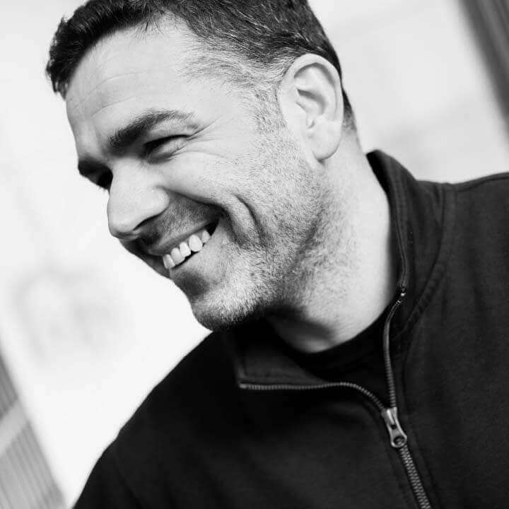 A Troax employee smiling
