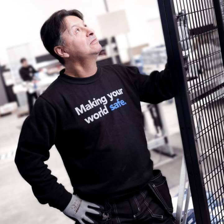 Employee standing with a product