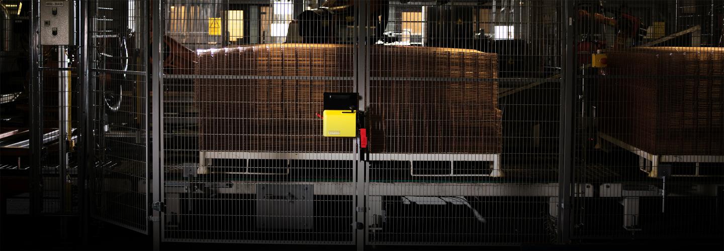 A machine guard on a production site with Troax Safe Lock.