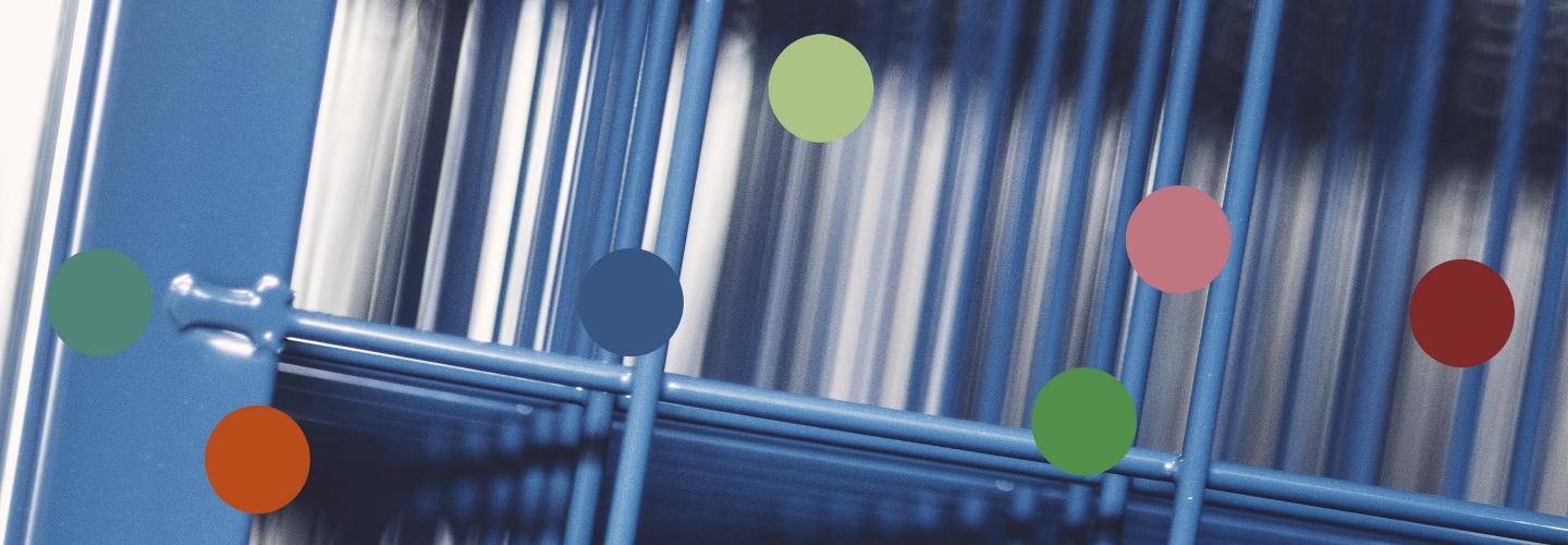 Blue mesh panel with coloured dots