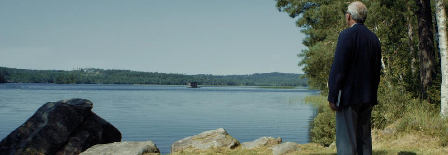 Thomas Widstrand, CEO, standing by a lake.