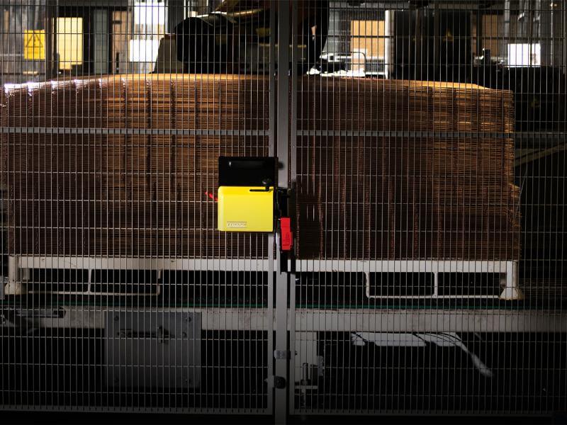 A machine guard on a production site with Troax Safe Lock.